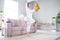 Photo of positive excited inspired dancer lady dance hold fluffy bear wear unicorn cosplay kigurumi indoors