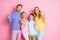 Photo of positive family daddy mommy and small kids girl boy make v-sign isolated over pastel color background