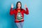 Photo of positive girl in christmas tree pullover sweater show jolly holly okay sign x-mas discounts promo wear denim