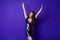 Photo of positive girl disco club scream raise hands wear skirt isolated purple shine color background