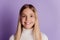 Photo of positive little lady toothy beaming smile wear white t-shirt posing on purple background