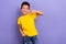 Photo of positive nice boy wear yellow trendy clothes thumb up cool feedback nice quality isolated on purple color