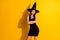 Photo of positive stunning witch lady enchant cross hands enjoy halloween theme party wear trendy luxury skirt isolated