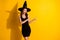 Photo of positive witch lady sorcerer point index finger copyspace indicate creepy gothic magic ads promo halloween