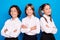 Photo of pretty charming schoolkids formalwear arms folded smiling isolated blue color background