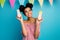 Photo of pretty dark skin lady holiday painted ginger bread bunnies colorful flags family meeting dinner wear red white