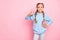 Photo of pretty little lady raising thumb up advertising buy cool school supplies wear casual blue hoodie pullover