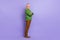 Photo of pretty retired man wear green sweater arms folded smiling isolated violet color background
