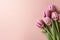 Photo pretty tulips on pastel background with copy space at the bottom