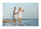 Photo printed on canvas, white background. Happy young couple on beach