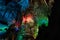 Photo Prometheus cave with beautifully illuminated stalactites and stalagmites