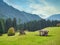 Photo of a quaint wooden shelter nestled in the picturesque Dolomite Alps of Italy