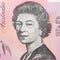 Photo of the Queens face from an Australian five dollar note