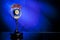 Photo of radio microphone on blue background