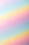 Photo of a rainbow-colored paper surface with glitter. Abstract pastel background