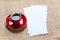 photo of red cup of coffee and several envelopes on the wonderful brown fabric background