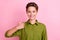 Photo of reliable lady raise thumb up approve solution wear green shirt isolated pink color background