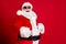Photo of retired old man grey beard hands big belly laughing out loud kid tell great christmas joke wear santa costume