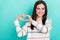 Photo of romantic affectionate lady demonstrate heart gesture wear striped pullover isolated blue color background