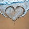 Photo Romantic gesture heart painted in sand on picturesque beach