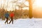 Photo of running athletes in winter forest