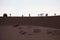 Photo of sand dunes with travellers, Silhuette