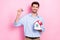 Photo of satisfied good mood realtor handsome guy hold sell keys new modern comfortable apartments miniature promo