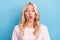 Photo of scared millennial blond lady look wear pink t-shirt  on blue color background