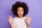 Photo of scared shocked afro american small girl raise hands horrified isolated on purple color background