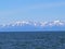 Photo scenery with the blue water surface of lake Baikal in Russia