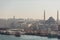 Photo of sea, boats, buildings in coastal zone.