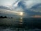 A photo of a sea view with a pretty cloud on it