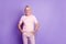 Photo of self-assured grandfather hands pockets look camera wear pink t-shirt pants isolated violet color background