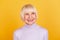 Photo of senior lovely lady wondered look empty space think dream isolated over yellow color background