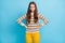 Photo of serious abused young woman dressed ornament pullover arms hands waist isolated blue color background