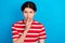 Photo of serious confident young man wear striped t-shirt lips mouth asking keep silence empty space isolated blue color