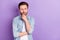 Photo of serious thoughtful minded suspicious man look copyspace thinking isolated on purple color background