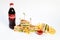 Photo session new menu of coffee house, fresh club sandwich, glass bottle of Coca Cola, french fries, ketchup isolated on white