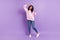 Photo of shiny cute dark skin woman wear pink sweater smiling dancing rising fists isolated violet color background