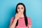 Photo of shocked amazed surprised woman cover close mouth with hand feel guilty isolated on blue color background