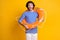 Photo of shocked crazy guy wear orange lifesaver wear blue white shorts isolated over bright yellow color background