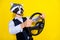 Photo of shocked weird freak guy racoon mask drive car hurry theme party event get accident isolated over shine yellow