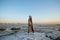 Photo shoot  woman on the shore of the Gulf of Finland in St. Petersburg in winter