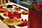 Photo showing red colored sweets in a Venetian pastry shop