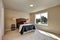 Photo of a small craftsman master bedroom with beige walls.