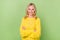 Photo of smart aged lady professional manager cross arms wear yellow pullover  green color background