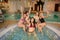 Photo of smiling females taking selfie picture in hot swimming pool in a spa salon