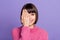 Photo of smiling good mood lovely girl cover close half face wear pink knitted jumper isolated on violet color