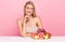 Photo of smiling lady sit table with fruits grapefruit, grapes mango vitamins for pure ideal silky skin isolated over