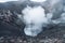 Photo of smoke volcano crater on Java island